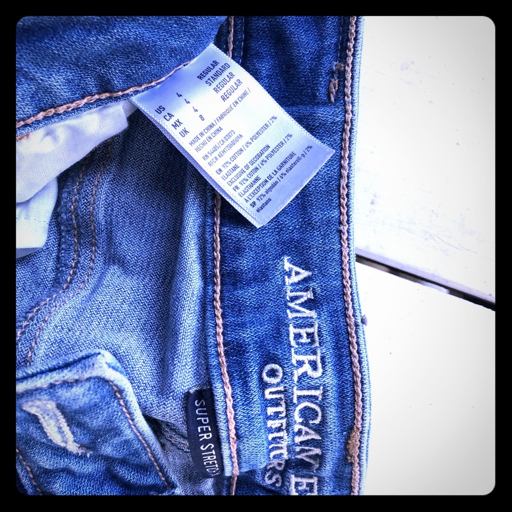 American Eagle distressed Super stretch size 4